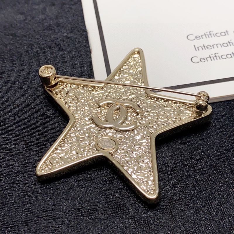 Ch**el brooches